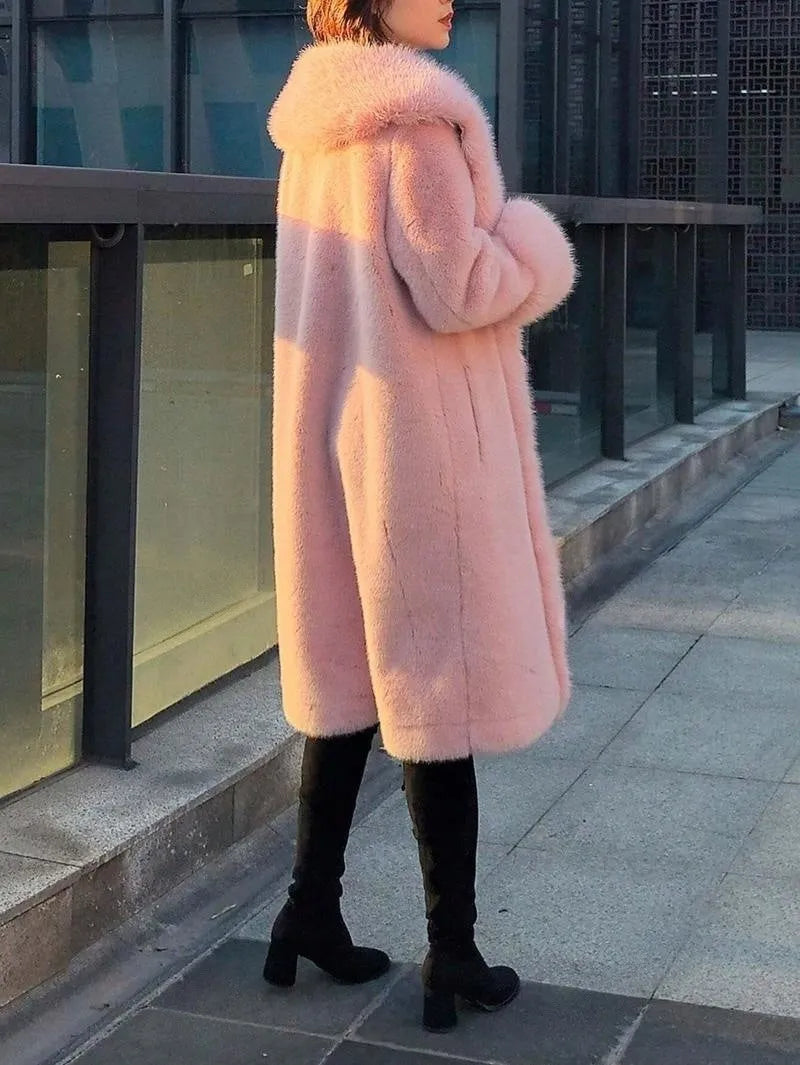 Grey women's mid-length faux fur coat with a thick collar on a hanger.