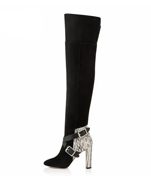 Women's black suede fashion boots with thick super high heel and round toe on a clean background