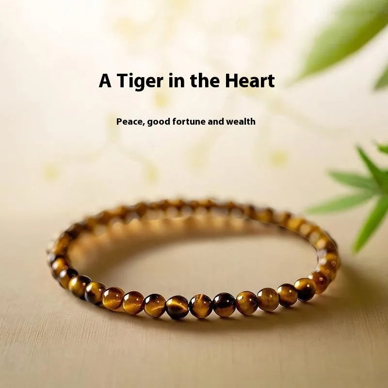Tigereye stone bracelet with geometric design showing round beads in new Chinese style