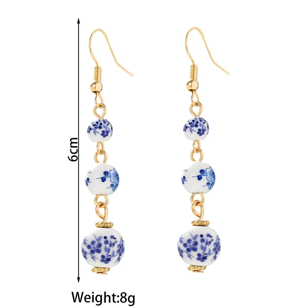 Blue and white porcelain ceramic bead long retro earrings with alloy construction and geometric design