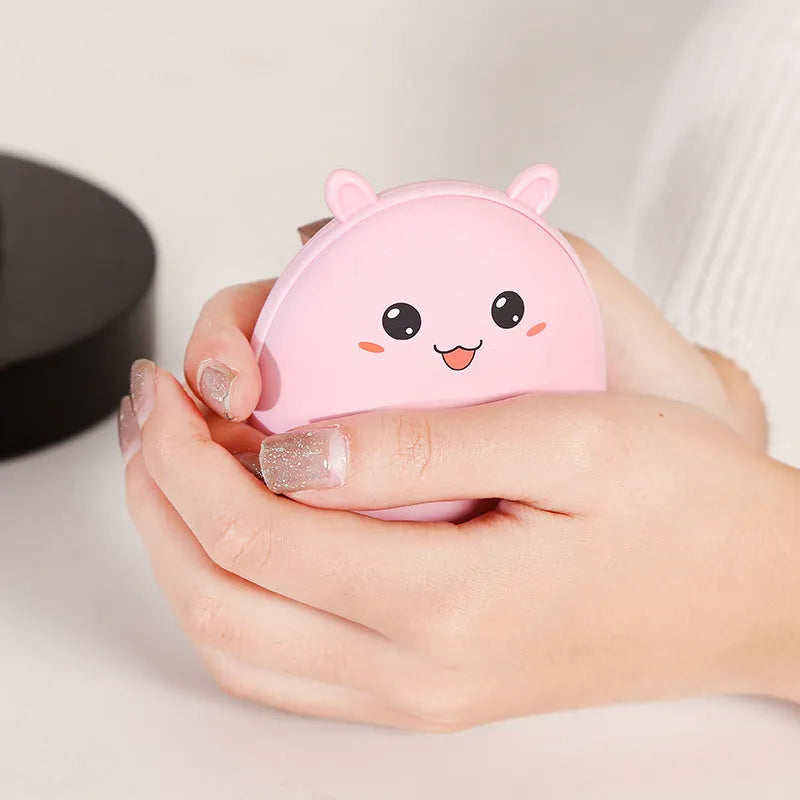 Multifunctional hand warmer power bank in brown and pink, compact size 10.5x8x5cm, with 2600mAh battery