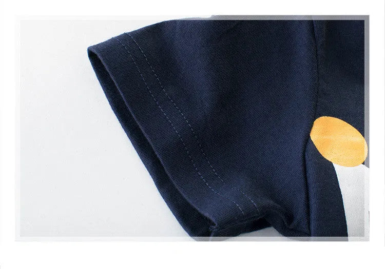 Boys' royal blue short sleeve cotton T-shirt on a hanger with a size chart visible.