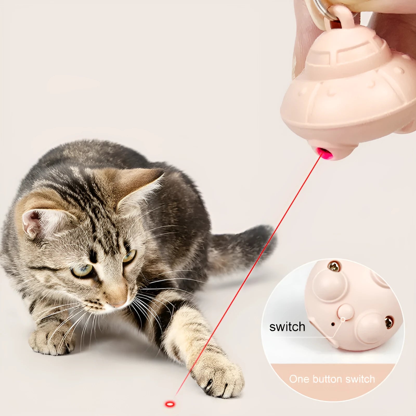 Green or pink cat collar laser toy with compact 3cm plastic housing showing USB charging port