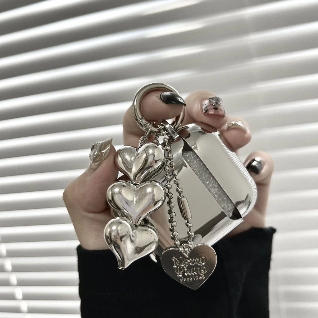 Electroplated solid colour heart pendant design TPU case for AirPods with a carrying chain attached