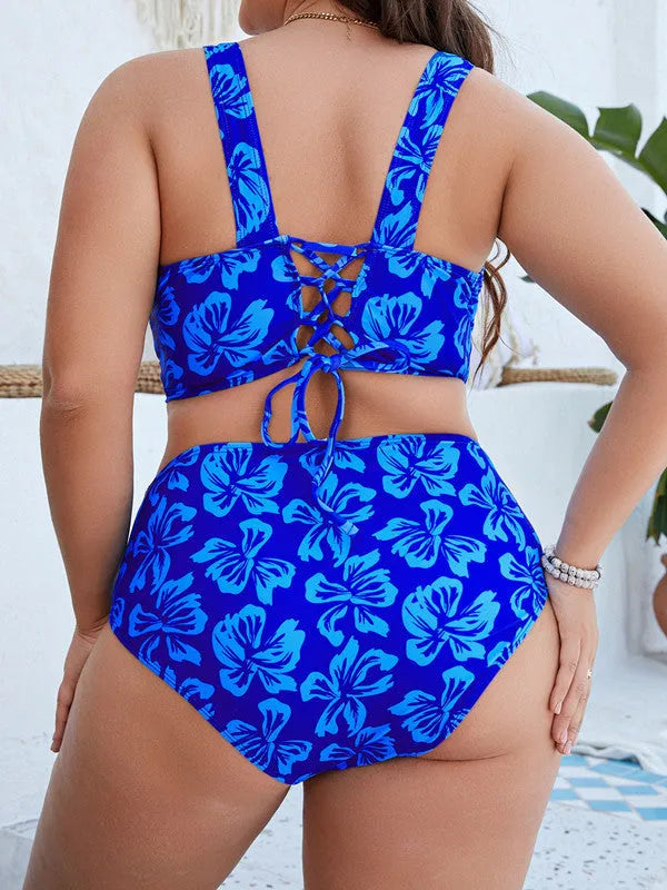 Blue floral print women's plus size bikini top and bottom for outdoor swimming.