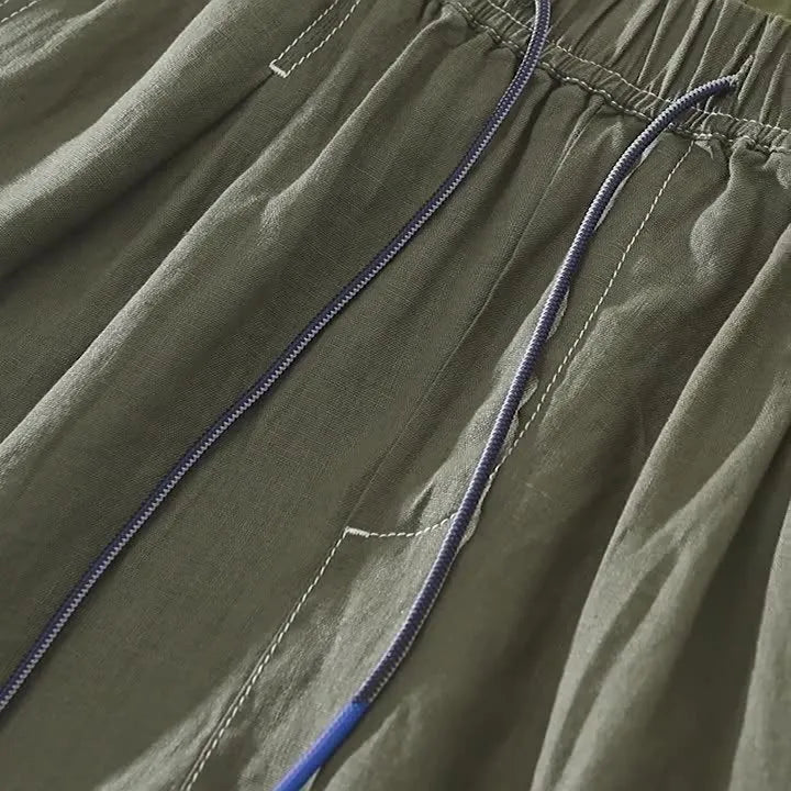 Men's linen straight drooping shorts in black or green with drawstring waist for summer casual wear