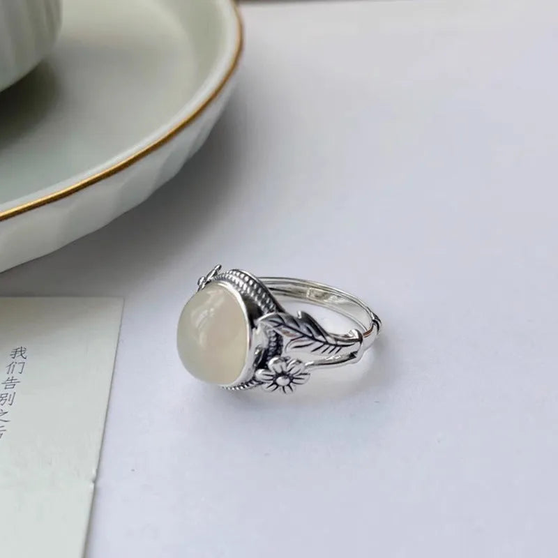 Copper vintage ring with adjustable opening and white chalcedony imitation colour