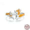 Silver-coloured adjustable ring featuring a raised cartoon corgi dog design, model SCR1014-E.