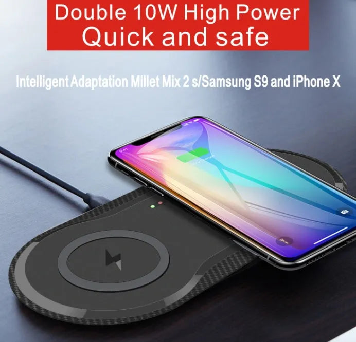 Black and white dual wireless charging pad with two phones charging simultaneously