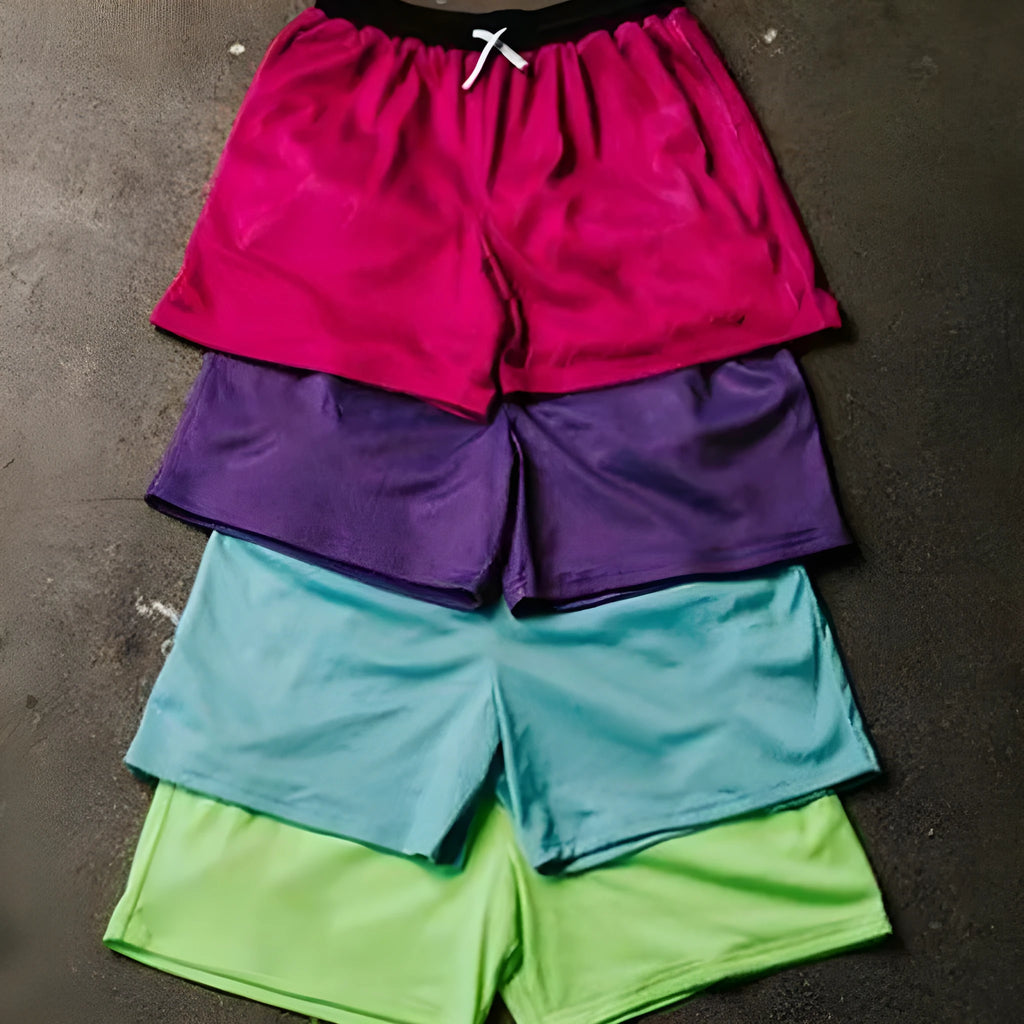 Men's solid-colour mesh quick-drying shorts for running in summer, shown in multiple colour options.