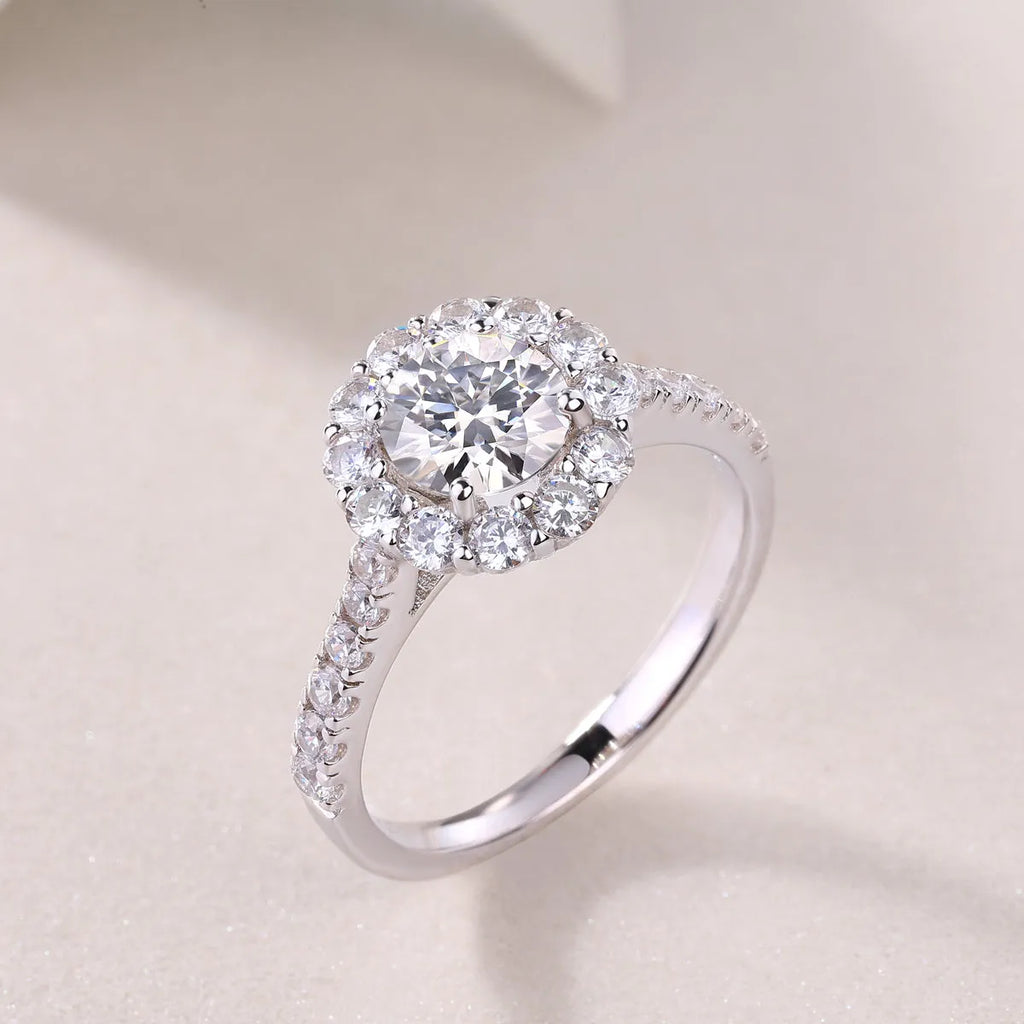 1-carat moissanite wedding ring set in S925 silver with platinum plating on white background