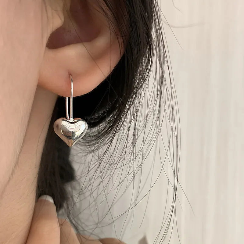 Korean style heart earrings with three-dimensional glossy finish and silver white gold plating