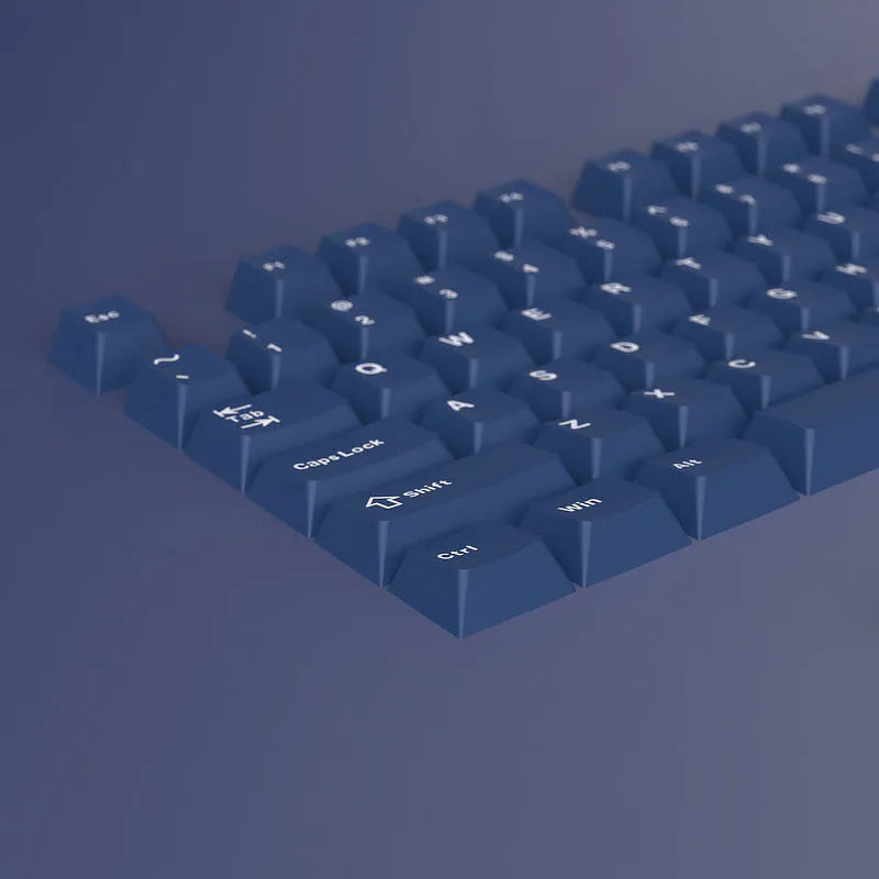 PBT two-tone blue key cap set with carved height profile, measuring 27cm x 17cm x 3cm