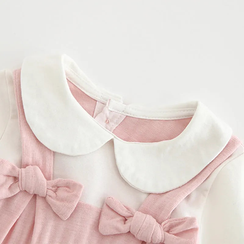 Pink embroidered cotton baby girl jumpsuit with long sleeves and single-breasted closure
