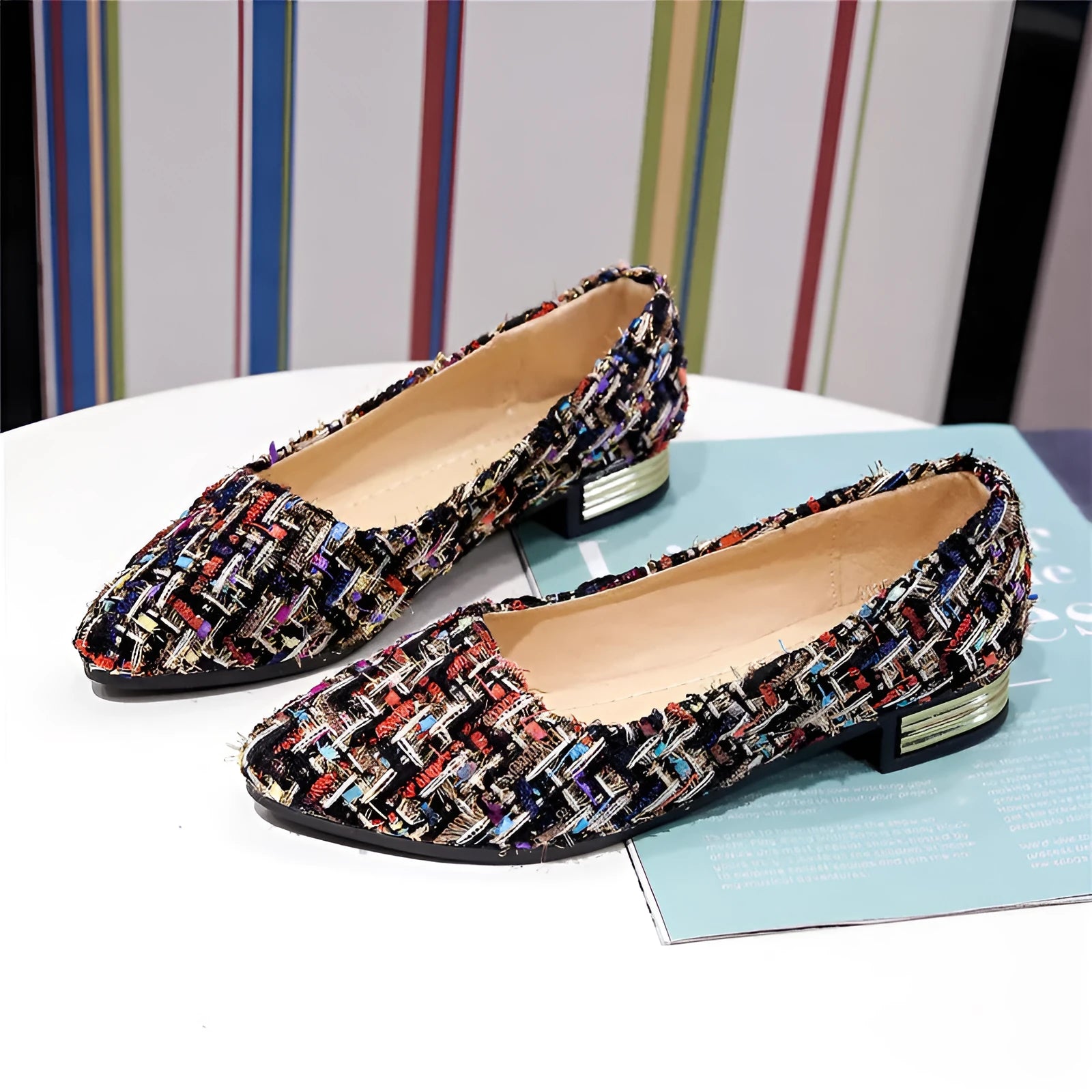 Women's black pointed-toe canvas casual shoes with flat rubber sole