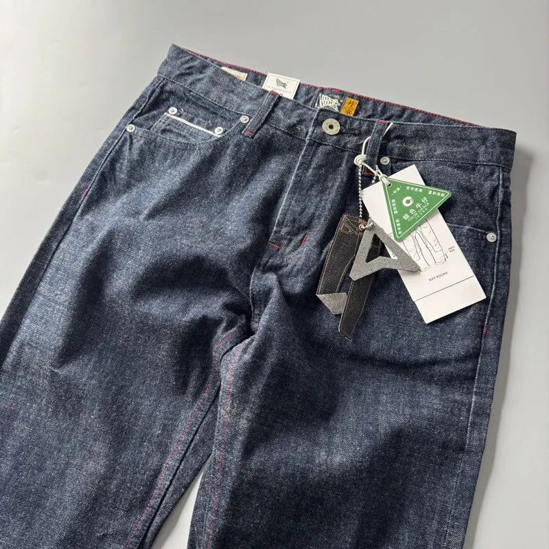 Men's straight leg denim jeans in primary colour showing mid waist fit and classic American retro style.