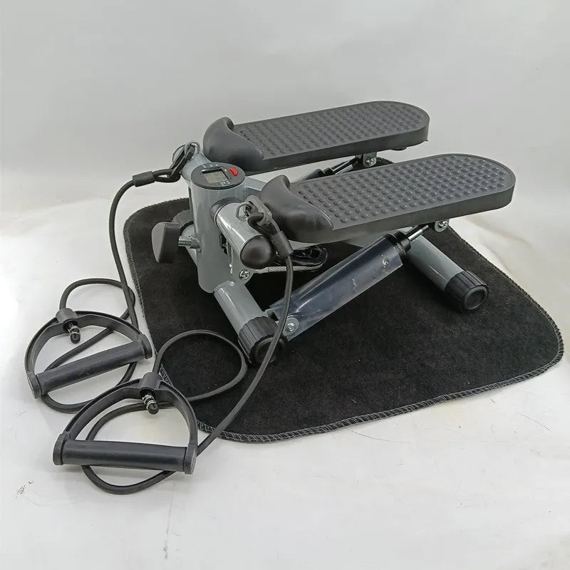 Silver grey household mini treadmill with hydraulic resistance and foldable pedals