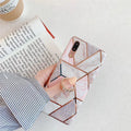 Geometric patterned purple TPU iPhone case with a silver metal ring on the back.