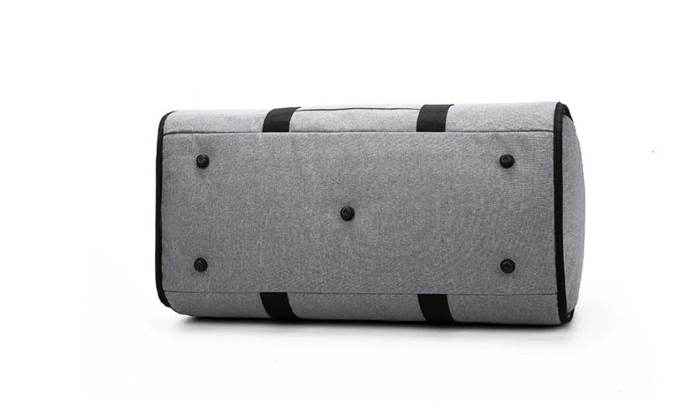 Medium cylinder travel bag in waterproof Oxford cloth, shown in black, with a zipper opening.