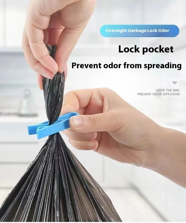 White PP plastic non-slip clip for fixing a bin liner to the side of a kitchen rubbish bin.