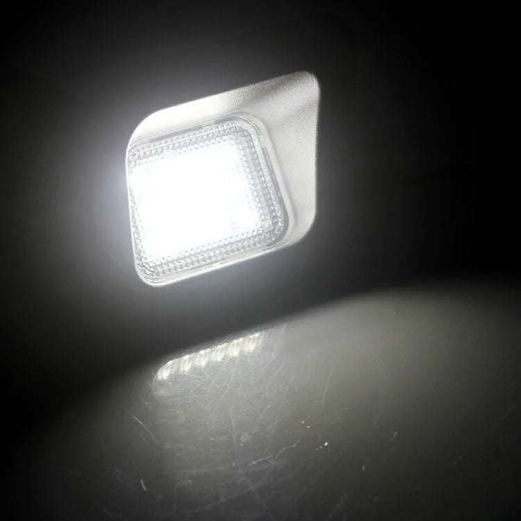Dodge Ram license plate light, 12V 5W, white 7000K, PC lens, Black Blackened or Transparent options