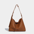 Soft PU messenger bag in caramel colour showing 36cm length and underarm shoulder strap