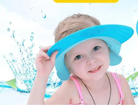 Soft silicone adjustable baby shower cap in green for child hair washing protection