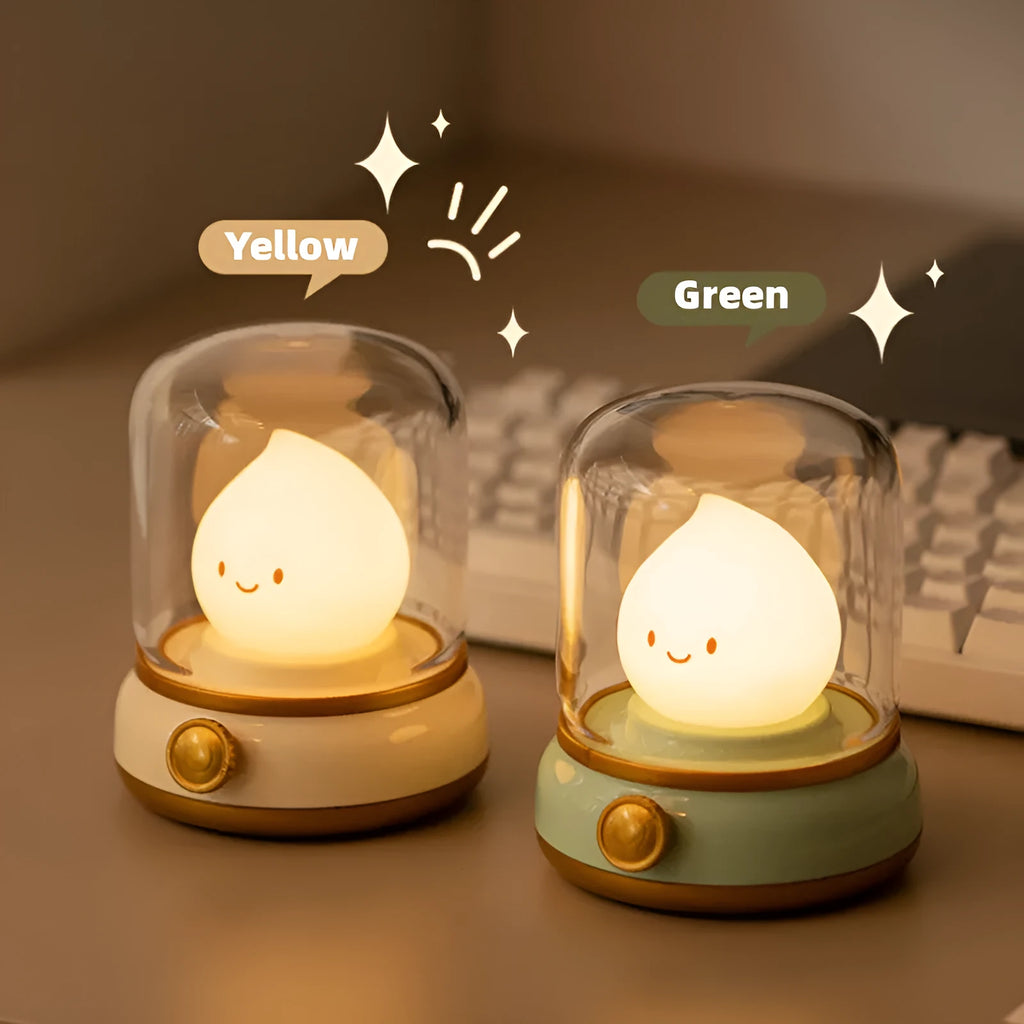 Green retro oil lamp design USB rechargeable LED desk night light on a wooden table.