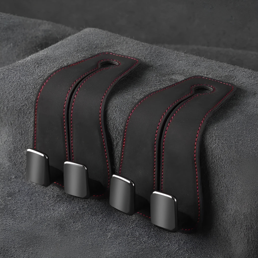 Car seat hook with flip-up mechanism in suede covering, shown in black colour
