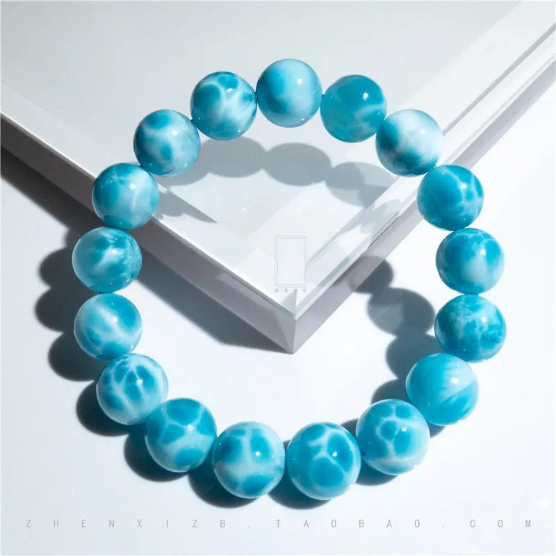 Blue unisex Bodhi bracelet with natural crystal sea-pattern stones and pearls in Maillard style.
