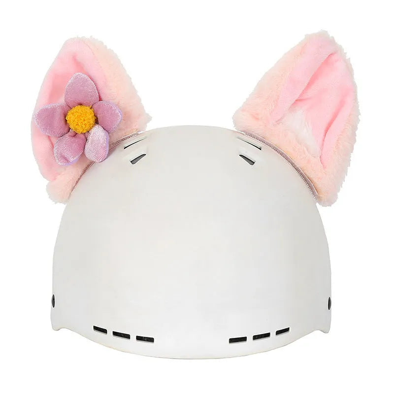 Soft plush cartoon character cover on a motorcycle helmet, showing size M and decorative ear sections.