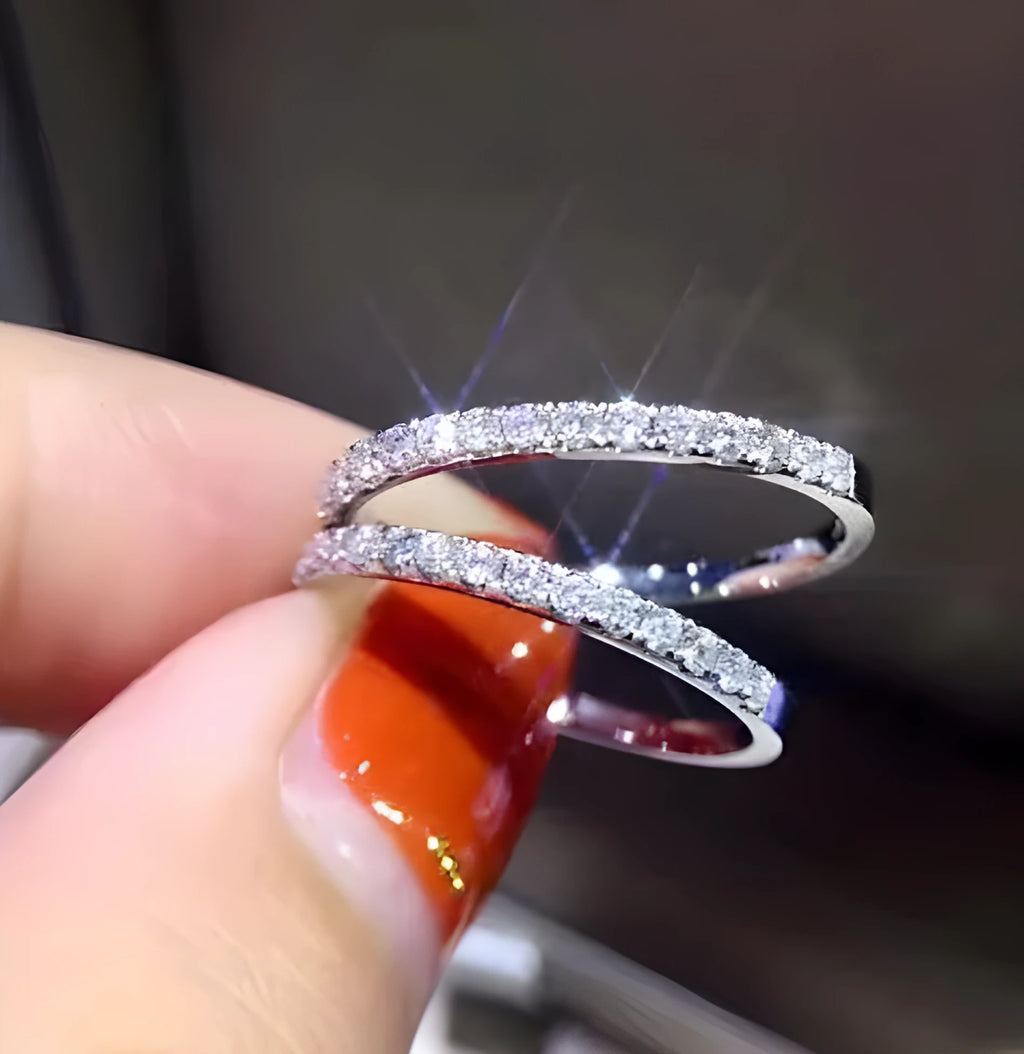 Women's crystal band ring in rose gold finish with cubic zirconia stones, US size 7