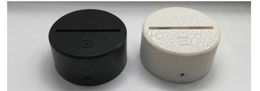 3D rose-shaped LED night light on a black base showing multiple colour options