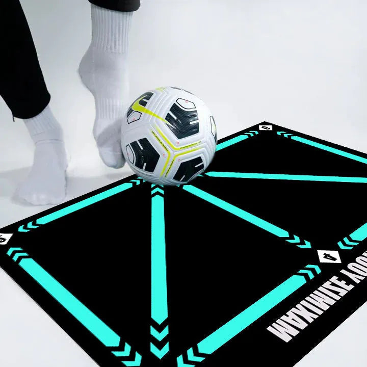 Black non-slip football training mat measuring 60 by 90 centimetres laid flat.