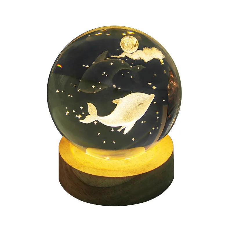 Transparent crystal ball night lamp with 3D carved jellyfish design, showing 6cm size on round base.