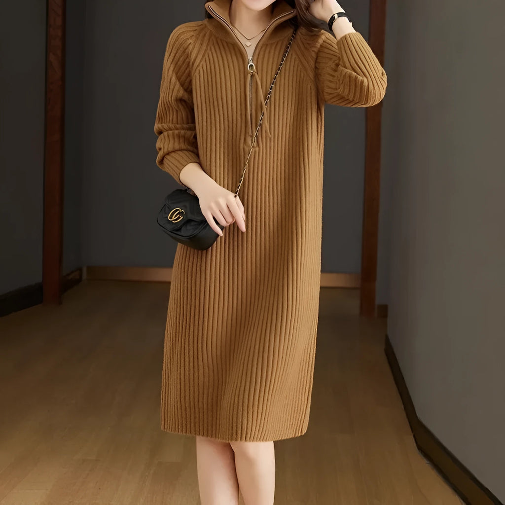 Beige woolen skirt with half zipper front, stand collar and loose long sleeves in straight dress silhouette
