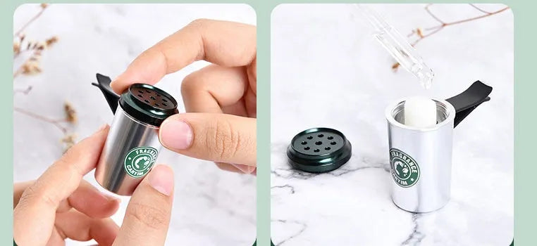 Silver alloy solid perfume seat in coffee cup shape with natural plant fragrance on a wooden desk