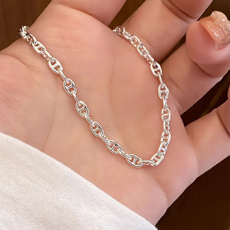 925 sterling silver chain bracelet with pig nose charm, polished silver colour, stackable design