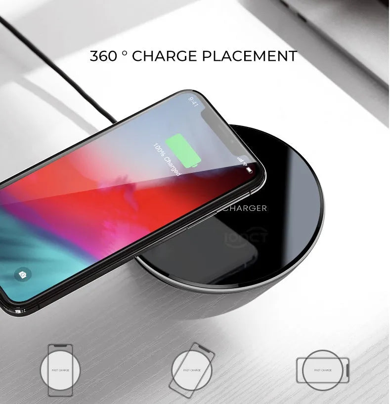 Black QI wireless charging pad with a smooth plastic surface and silicone non-slip base.