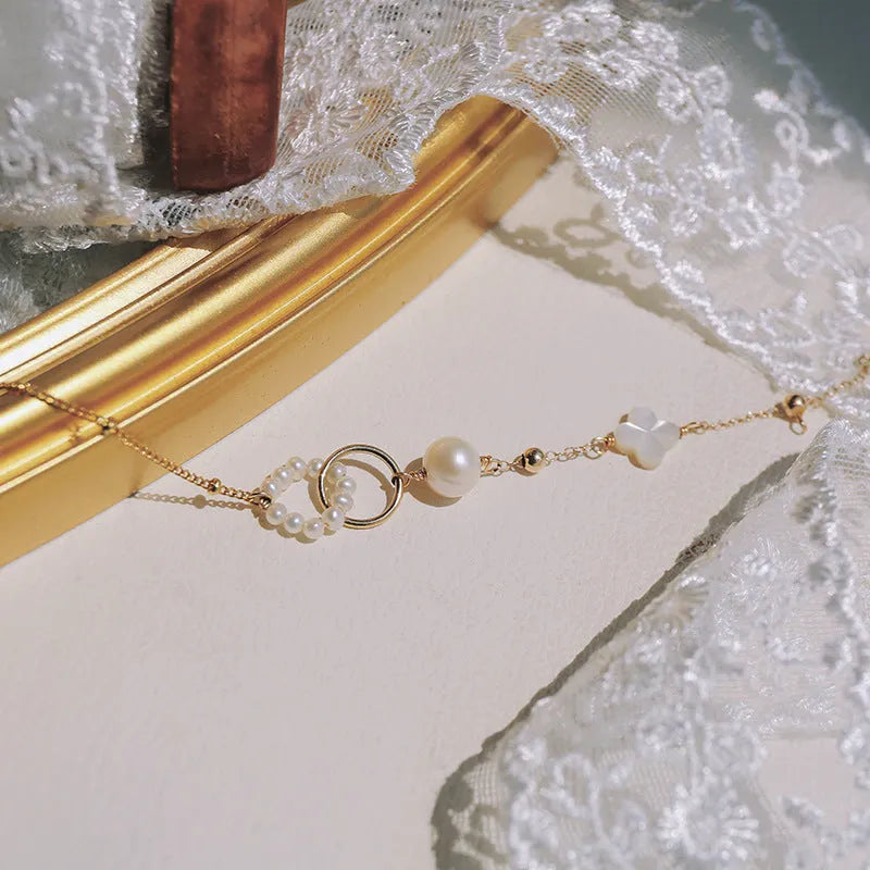 Women's natural pearl bracelet with freshwater pearls and 14k gold-plated fittings