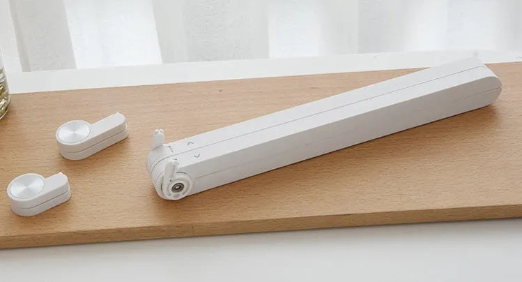 White Whale Race adjustable laptop stand with cooling radiator base for Apple MacBook.