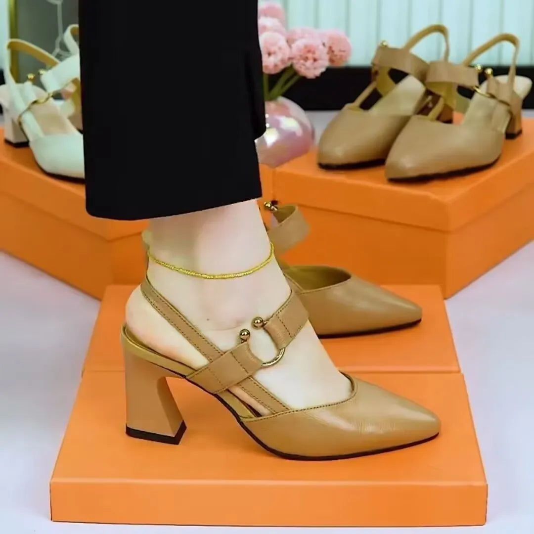 Women's apricot coloured closed toe sandals with backless straps and a chunky pigskin leather heel.