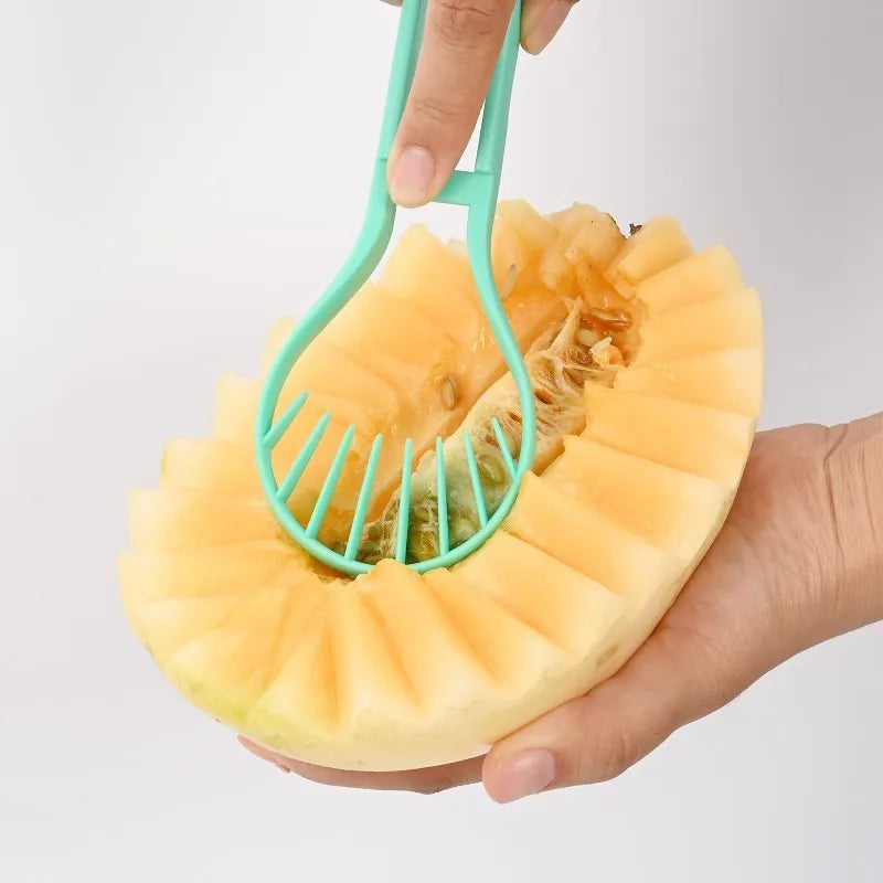 3-in-1 fruit carving knife set with melon baller, V-shaped carver, and scoop nested together on a kitchen counter