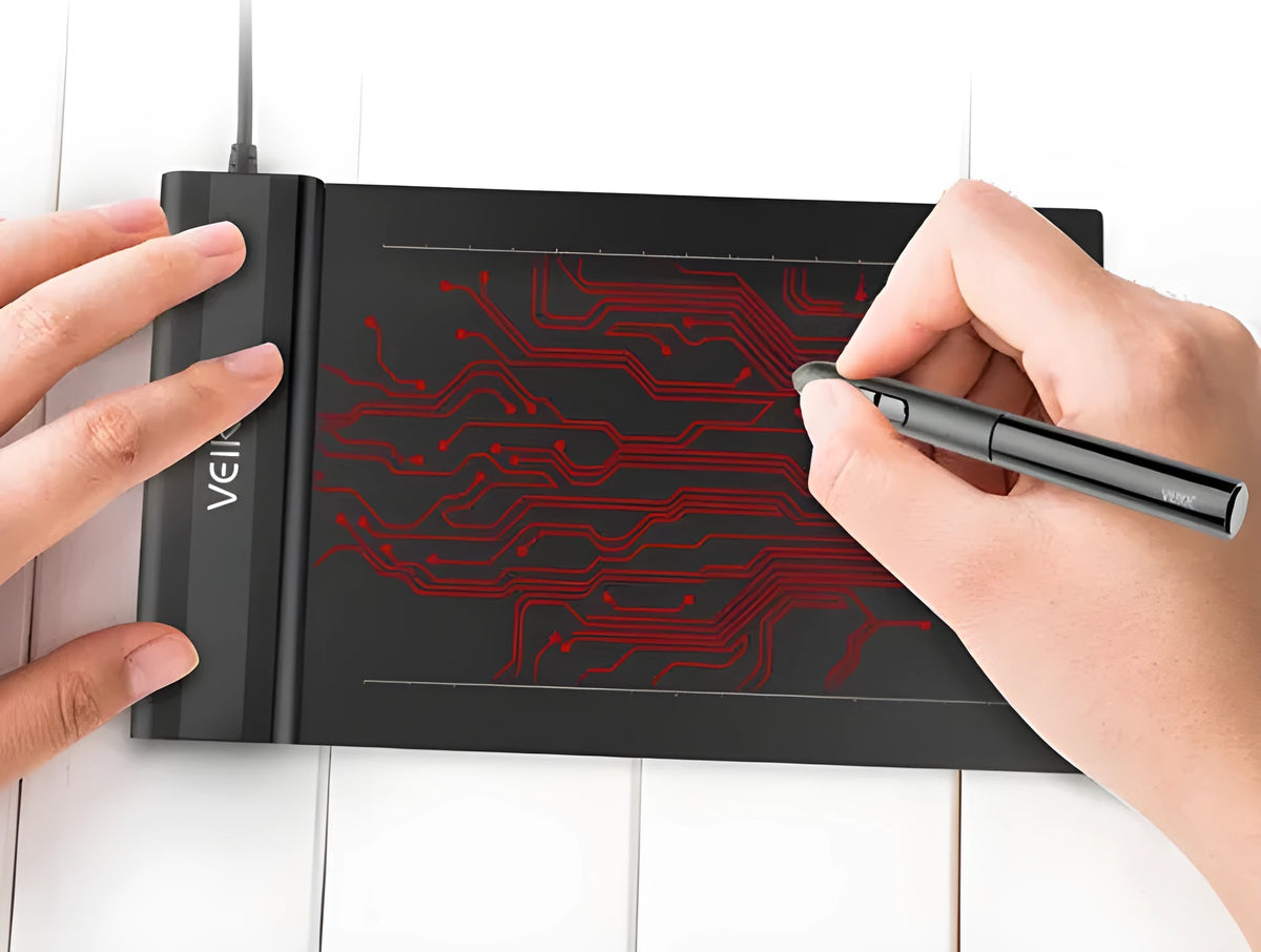 S640 black graphics tablet with passive pen on white background, 6x4 inch active zone