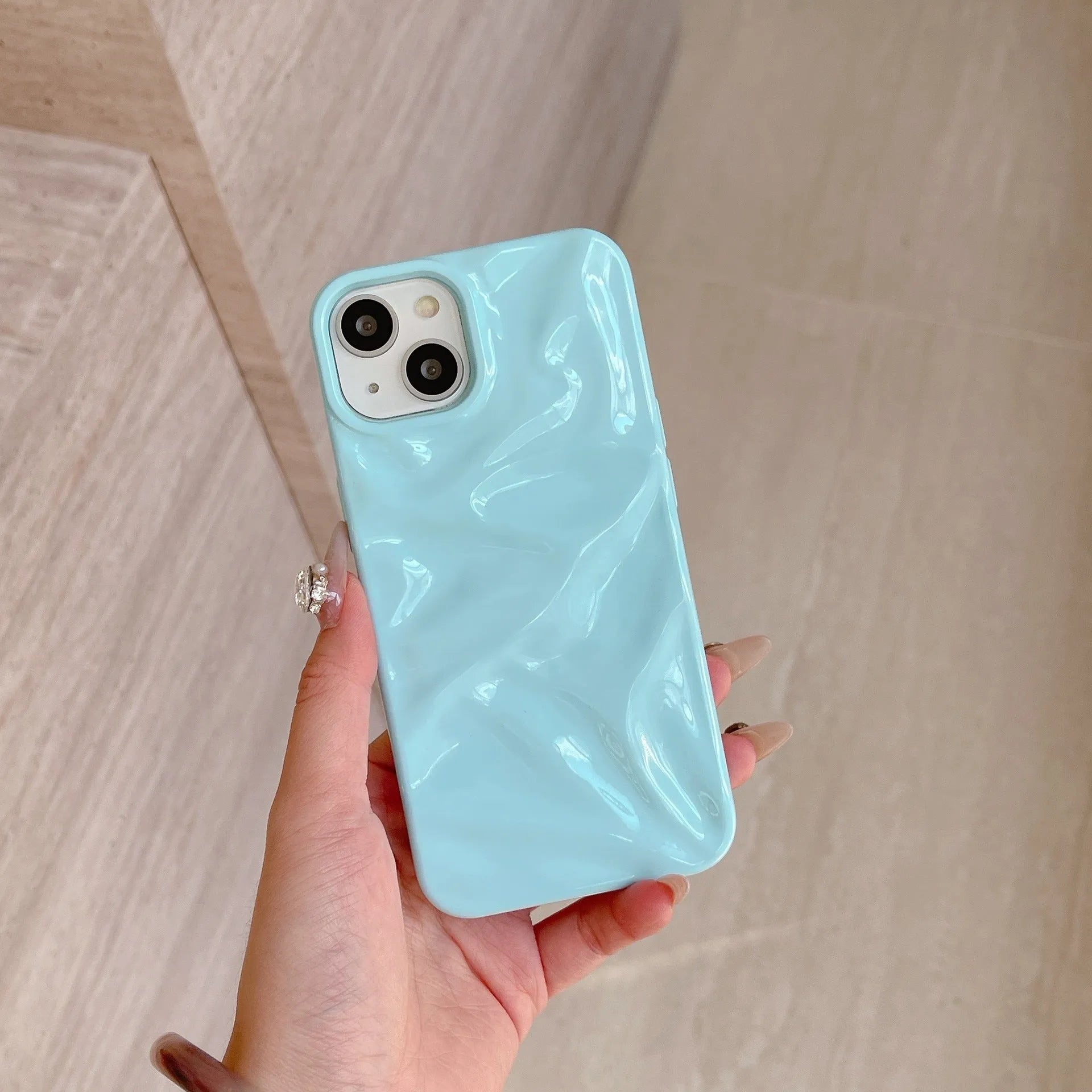 Electroplated three-dimensional pleated pattern TPU phone case in gold for iPhone 14 Pro Max