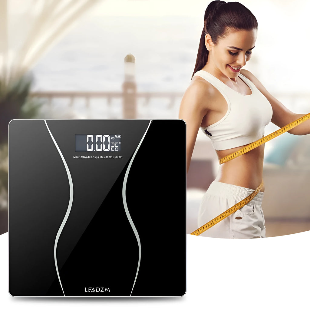 Black electronic household scale with digital display for weight measurement up to 180kg