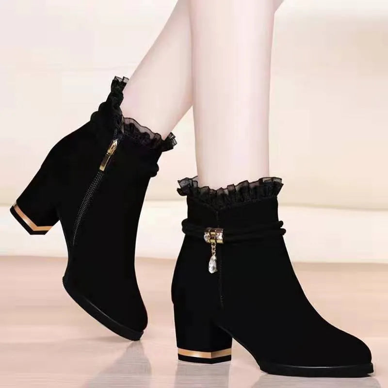 Black Season Tide sandal boots with mid-heel, tassel detail, and round toe for women