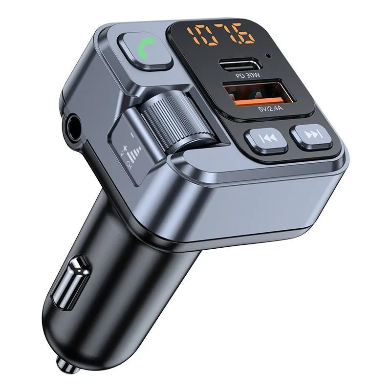 Bluetooth car MP3 player and fast charger plugged into a vehicle's 12V socket with LED display visible.