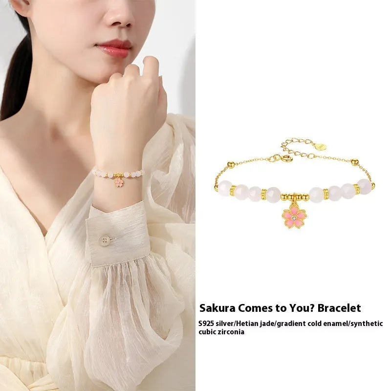 Pink gradient Hetian jade and 925 silver bracelet with epoxy cherry blossom pendant.