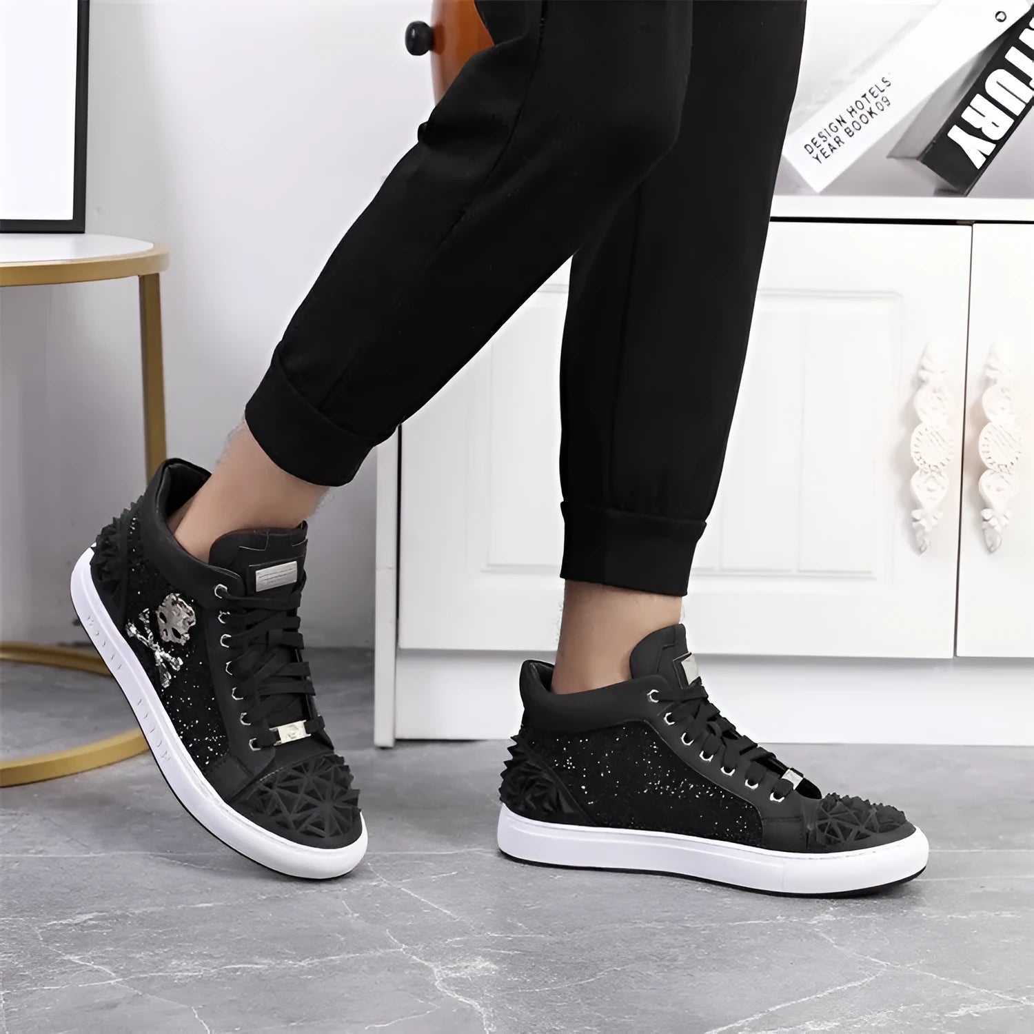 Men's black genuine leather high top skeleton shoes with red laces, shown on a foot.